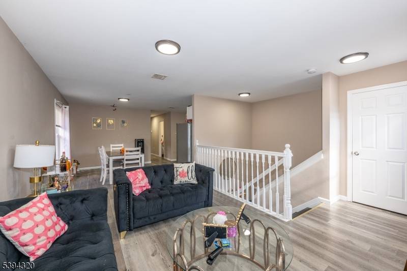 Welcome to this young, beautifully maintained two family home offering space, comfort, and incredible upside in one of the areas fastest developing neighborhoods.