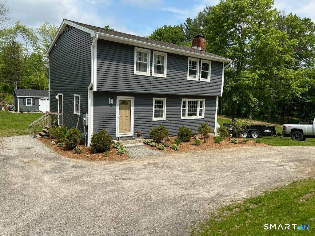 Updated 3 bdrm, 3 bath colonial including master bath, with open concept, hardwood floors throughout, kitchen with an island, and new Kitchen Aid appliances on 1 level acre.