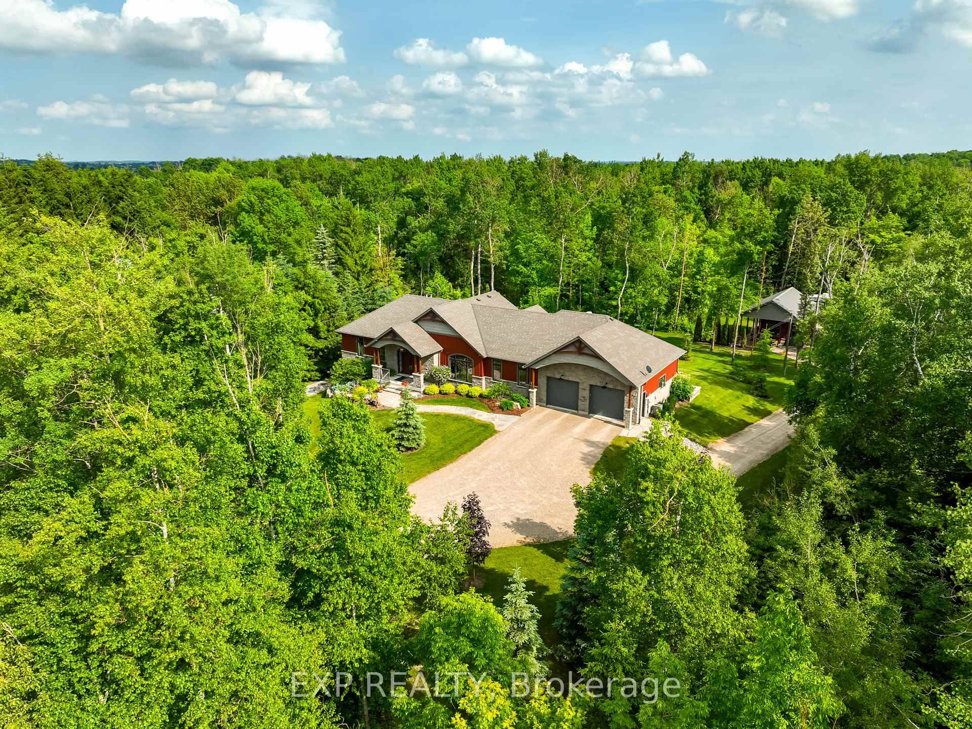 Crafted in 2019, this architecturally elegant bungalow offers the rare harmony of sophisticated design and the serenity of country living.