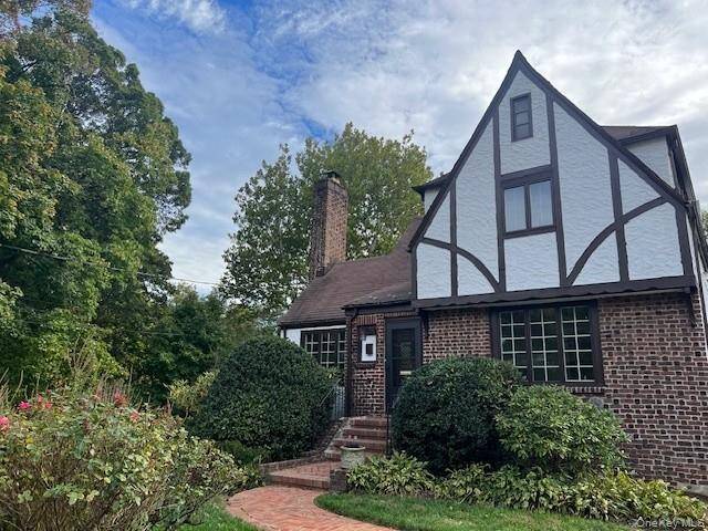 Welcome home to this charming and beautifully appointed four bedroom, two bath Tudor nestled in one of Larchmont s most coveted neighborhoods, Larchmont Gardens.
