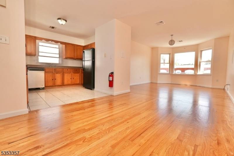 Welcome to this newer construction two family home built in 2005, perfectly located in North Newark.