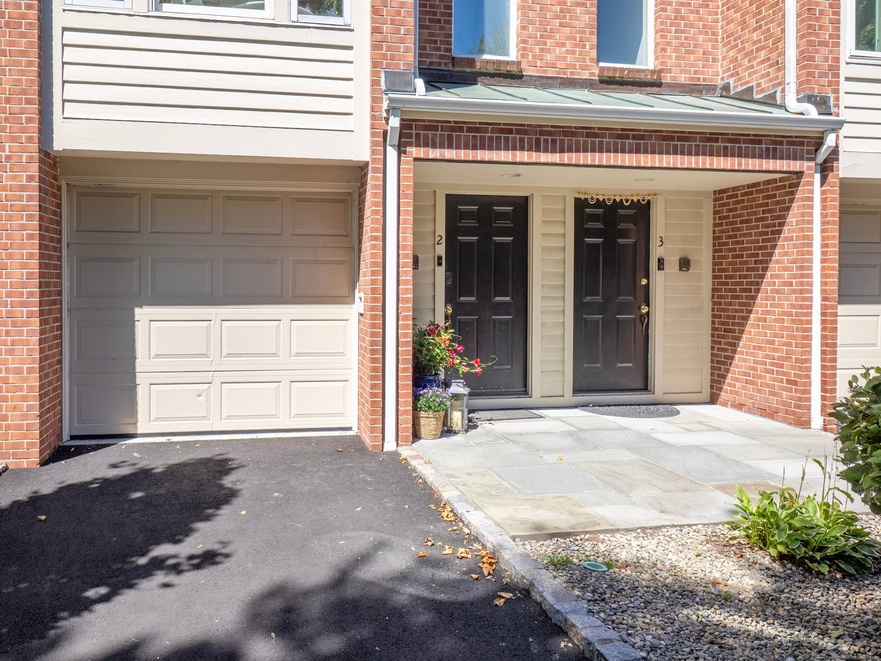Don't miss this stunning, newly updated 2 bedroom, 3 full, 1 half bath townhouse in Darien's desirable Pine Brook complex.