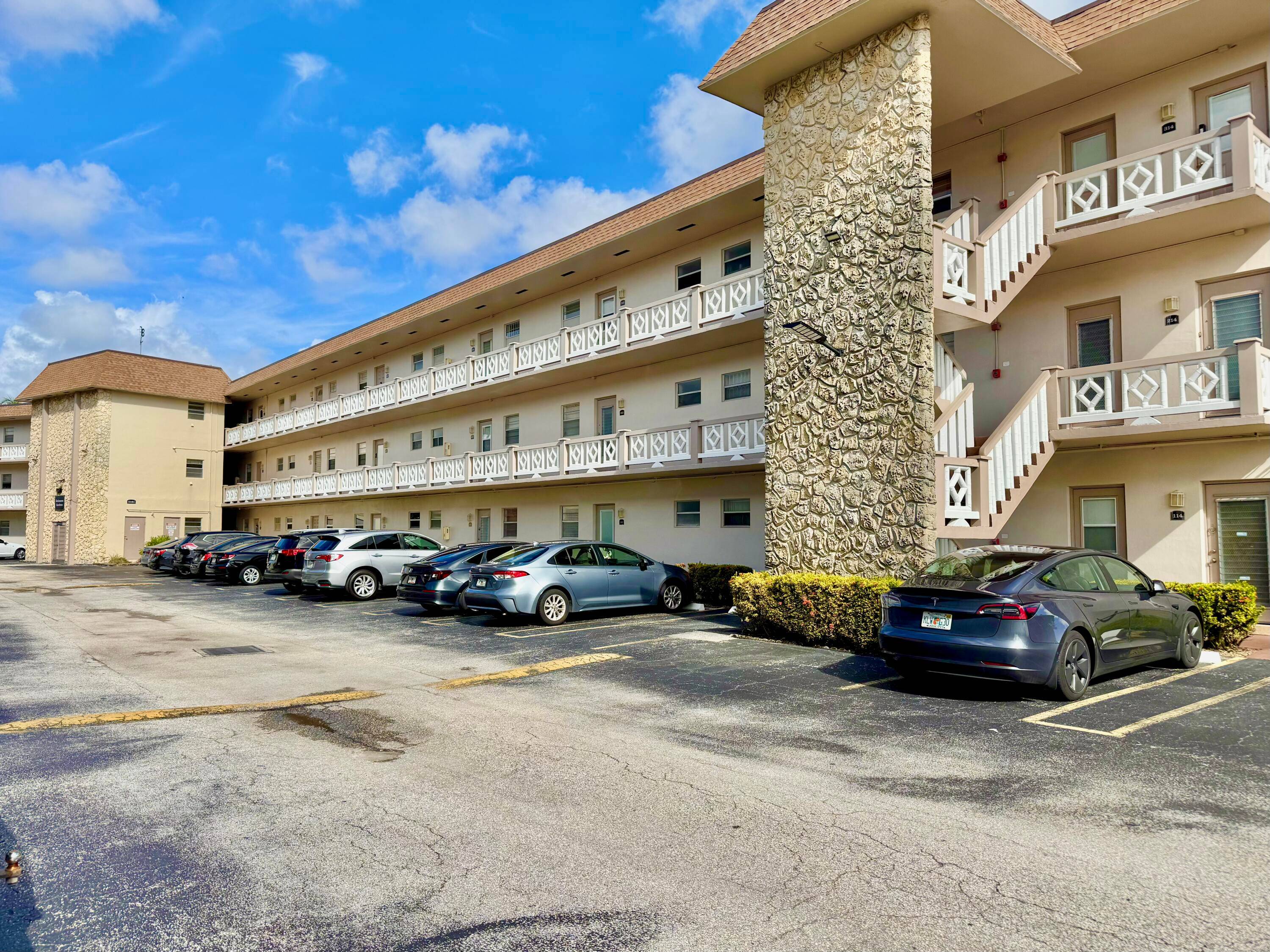 Spacious 2nd floor 1 bed, 1 bath condo with elevator access and a large enclosed patio that can double as a bonus room or office !