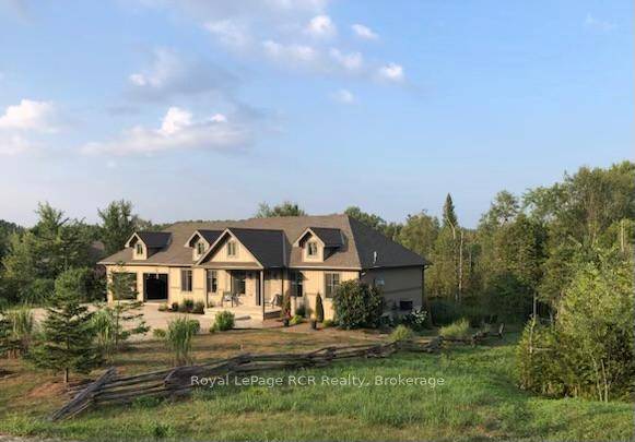 Welcome to this beautifully constructed 2 2 bedroom, 3 bathroom bungalow, custom built in 2016 by a builder for his own retirement.