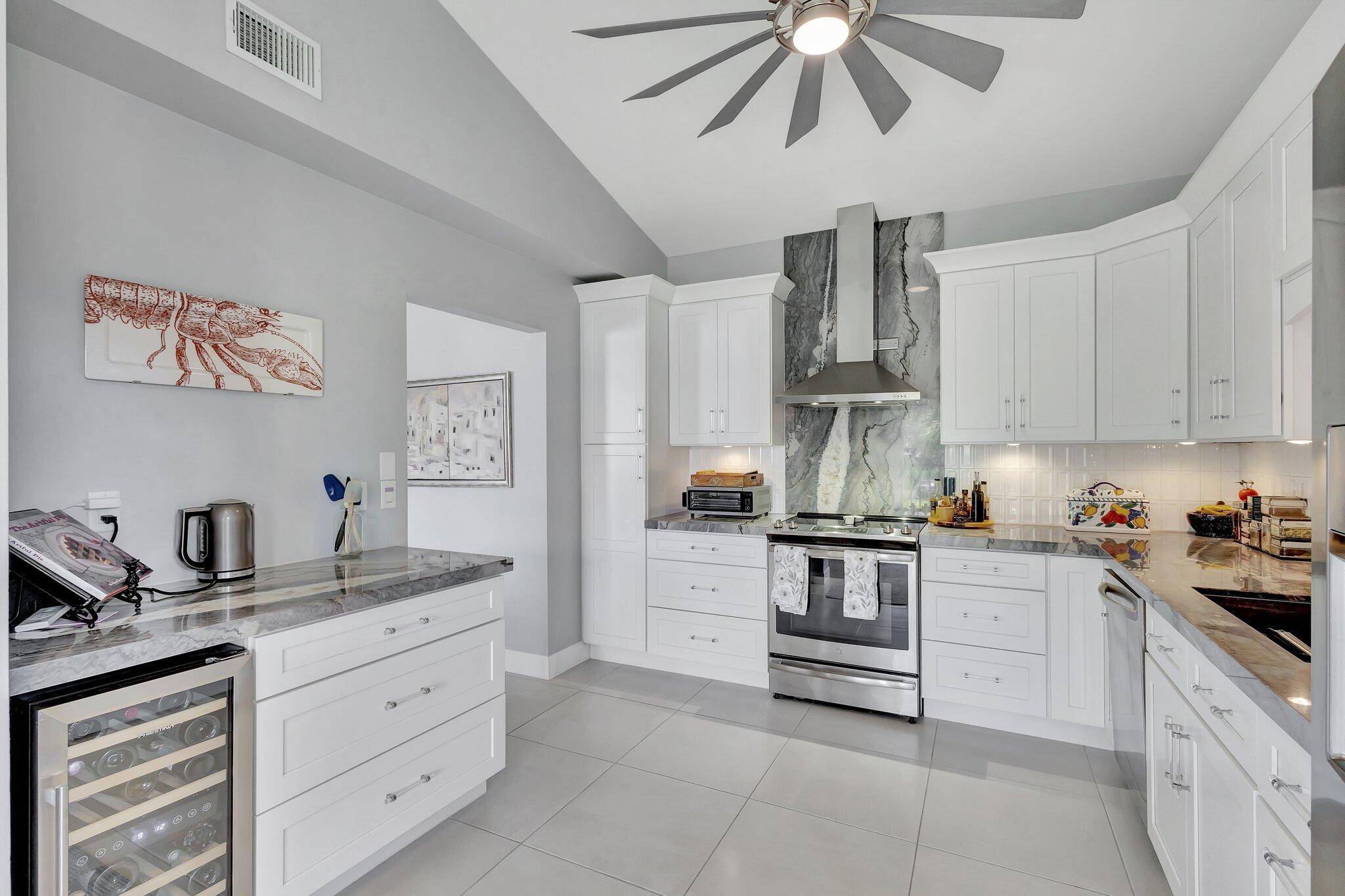 Welcome home to this beautifully renovated 3 bedroom, 2 bath condo that's sure to impress from the moment you step inside !