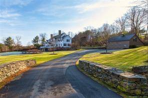 GEORGIAN COLONIAL ON PRIVATE LANE This dramatic home is located within minutes of town yet, affords dramatic open northwest views of the Taconic Range.