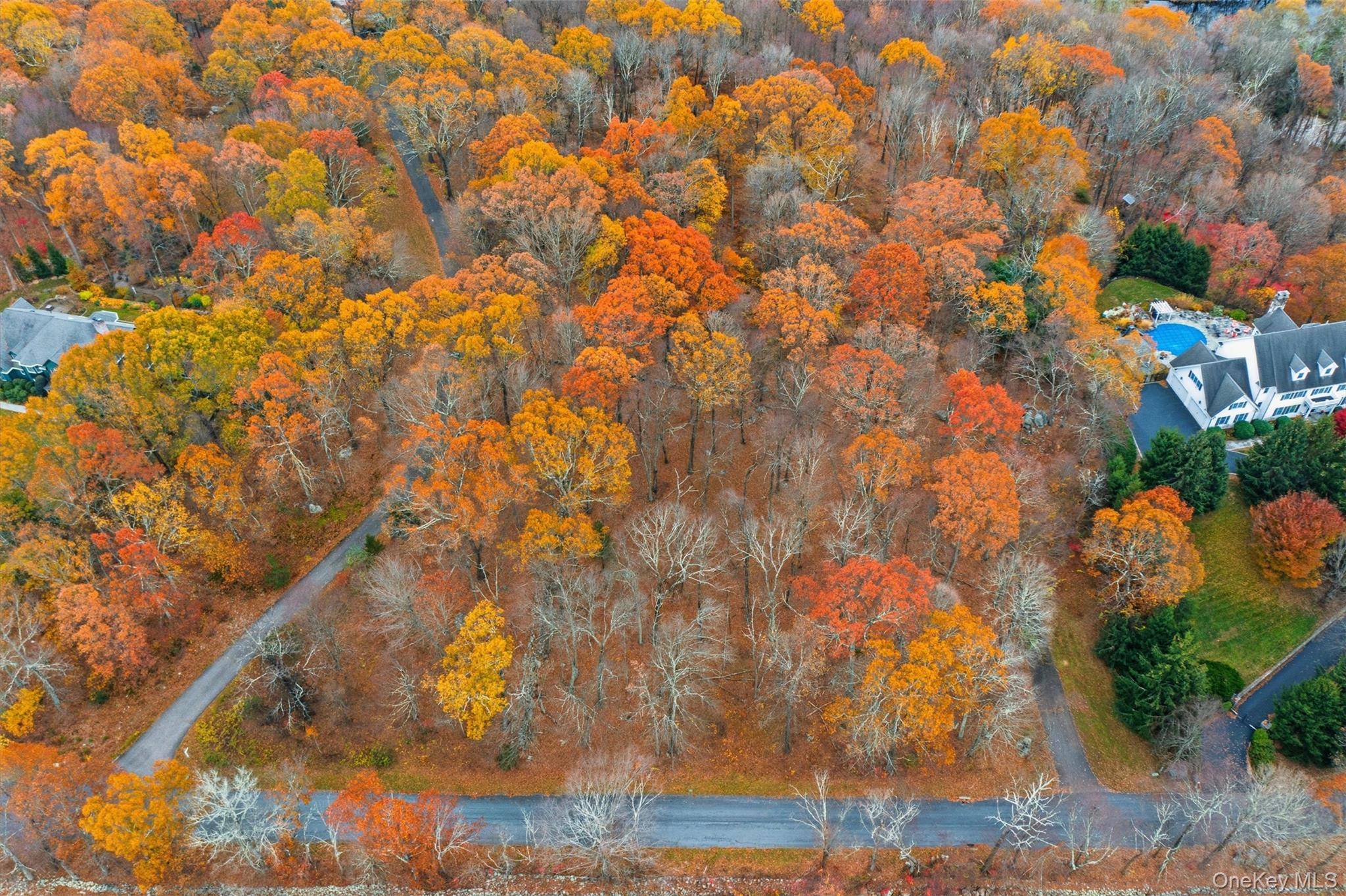 Build your dream home, or create even more privacy if purchased with 21 Spring House MLS 932202.