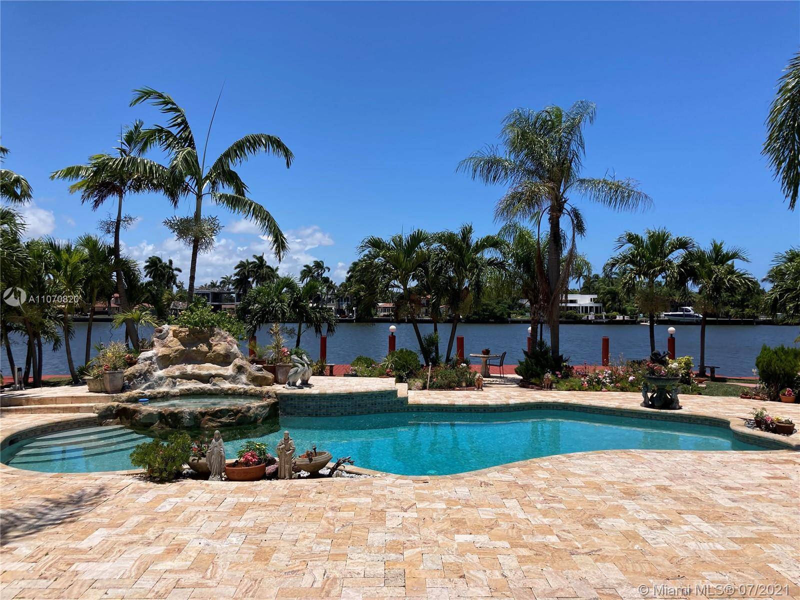 Waterfront pool home for rent in desirable Hollywood Lakes with 4 bedrooms, 4 full bathrooms and over 5, 000 square feet of living space.