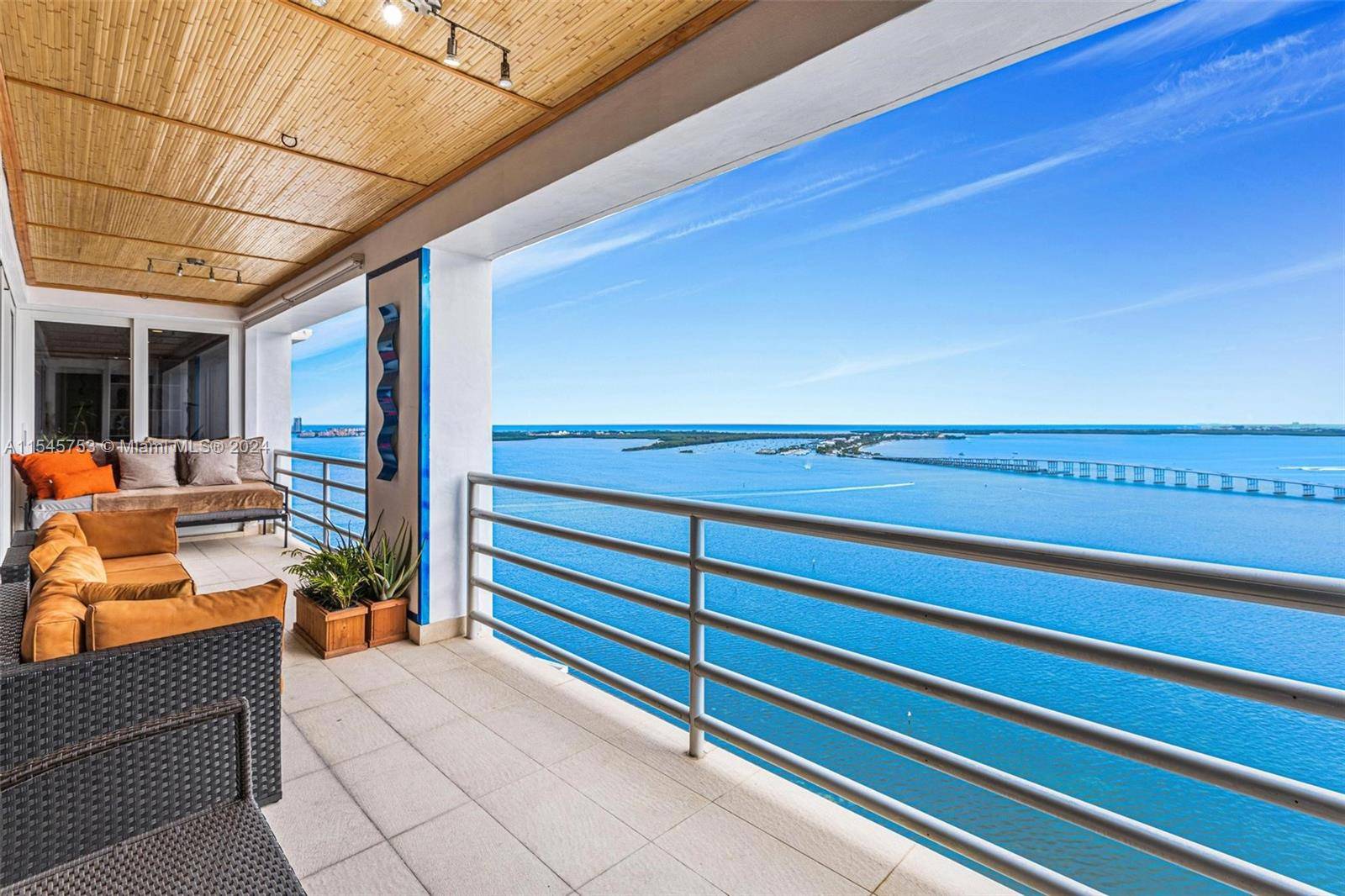 FULLY RENOVATED PENTHOUSE OVERLOOKING THE BAY WITH PANORAMIC WATER VIEWS !