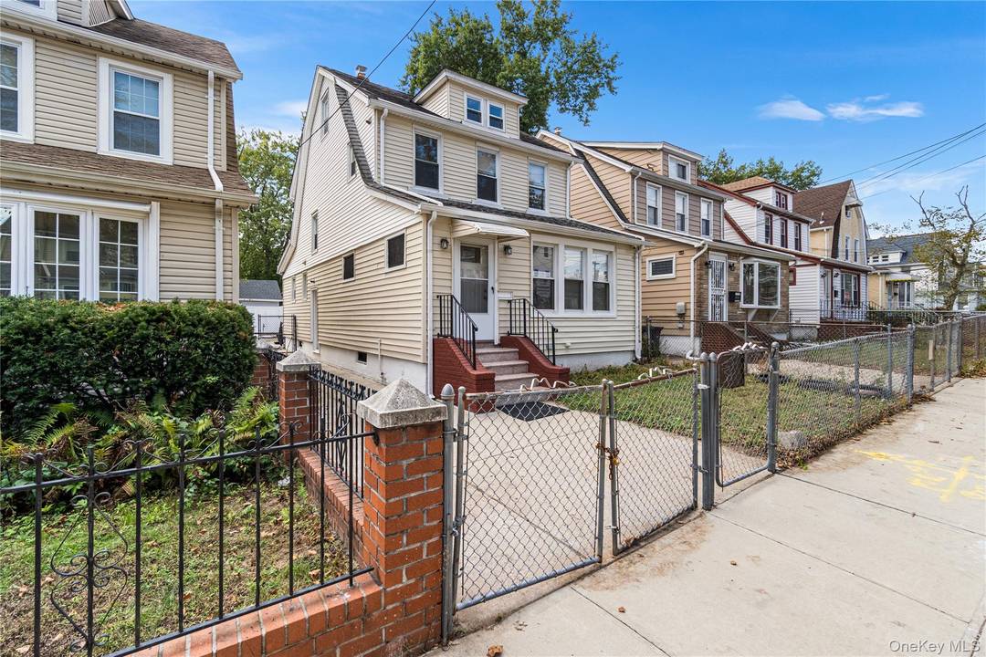 This newly renovated duplex home in Queens Village is used as a 2 family.
