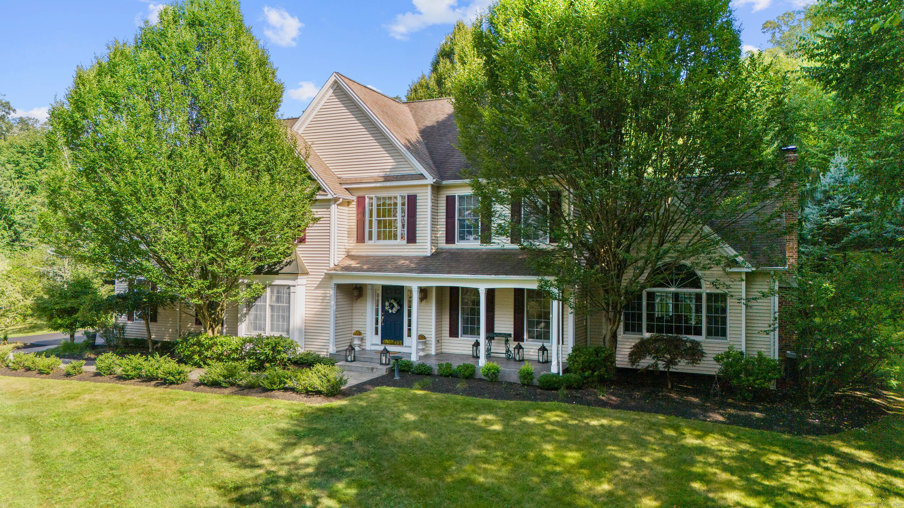 Stately Colonial offering timeless elegance and modern comfort, beautifully situated to capture sweeping views.