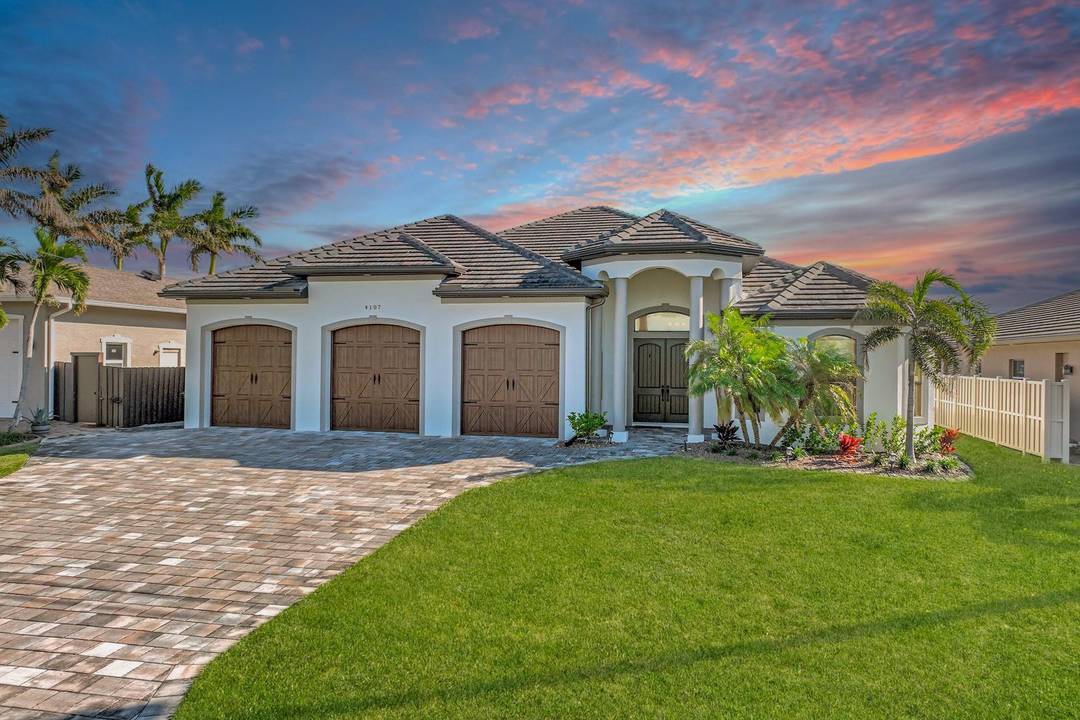 Experience luxury waterfront living in this 2018 ICF built home featuring steel reinforced concrete walls, 2 owner s suites, Gulf access, a heated pool, composite dock, tiki hut, and 16k ...