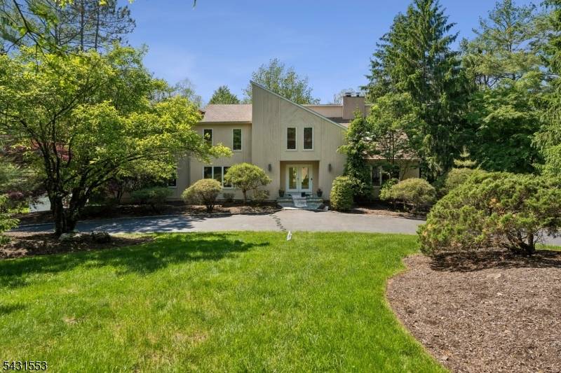 Nestled at the end of this mature tree lined cul de sac on.