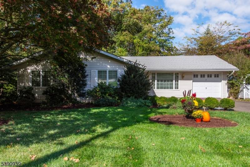 Easy living ! This stunning expanded ranch is amazingly larger than it appears and offers an incredible amount of living and entertaining space.