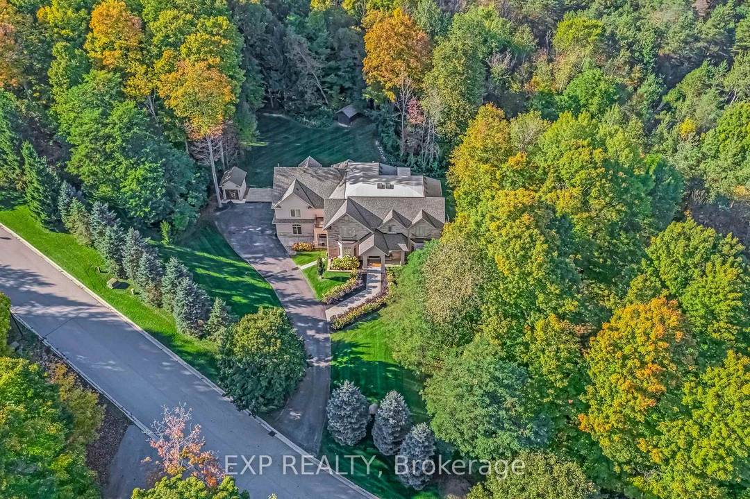 Nestled On Two Private, Treed Acres Within An Exclusive Cul De Sac Where Homes Are Rarely Available, This Sensational Custom Estate Presents An Unparalleled Lifestyle Of Privacy And Luxury.