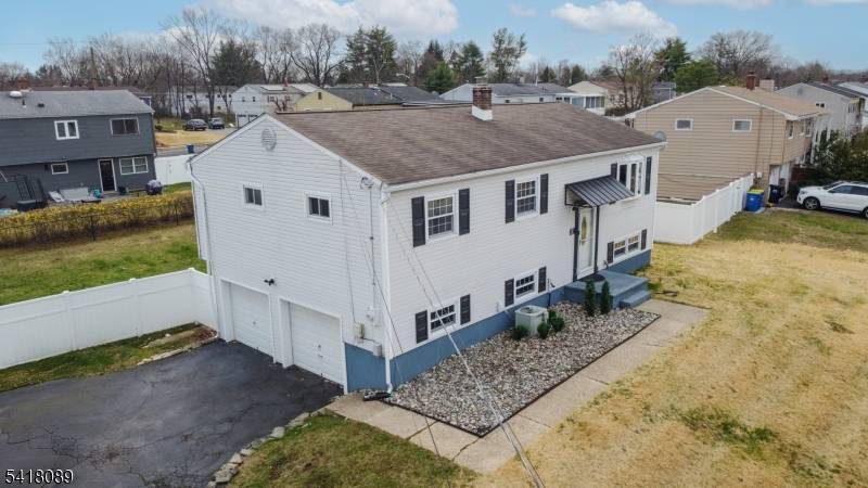 Nestled in a peaceful, sought after neighborhood, this beautifully updated 4 bedroom bi level home offers the perfect blend of modern upgrades and comfortable living.