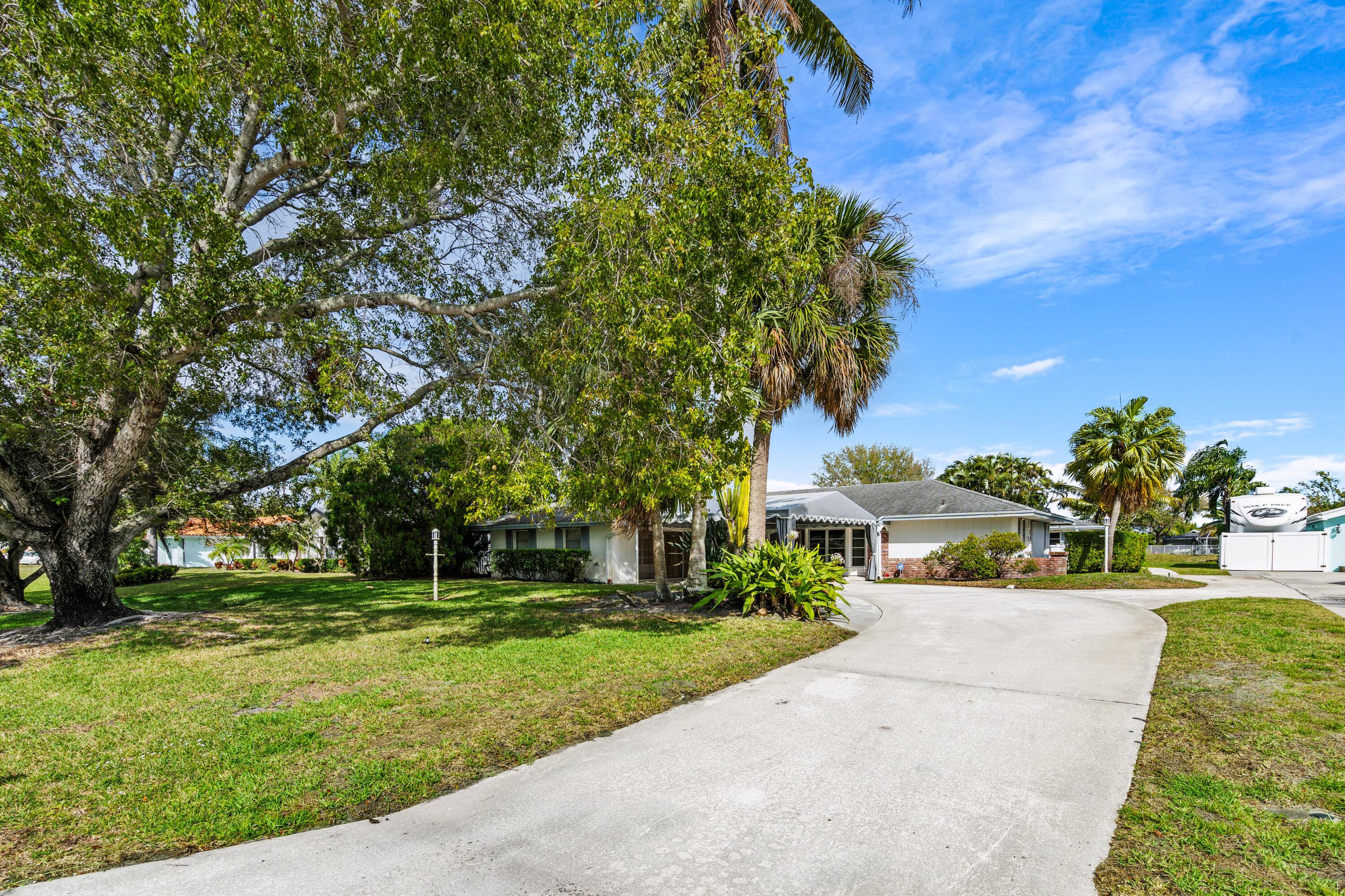 Seize this unique investment opportunity or family compound with 2 separate homes featuring a 4 bedroom, 2.
