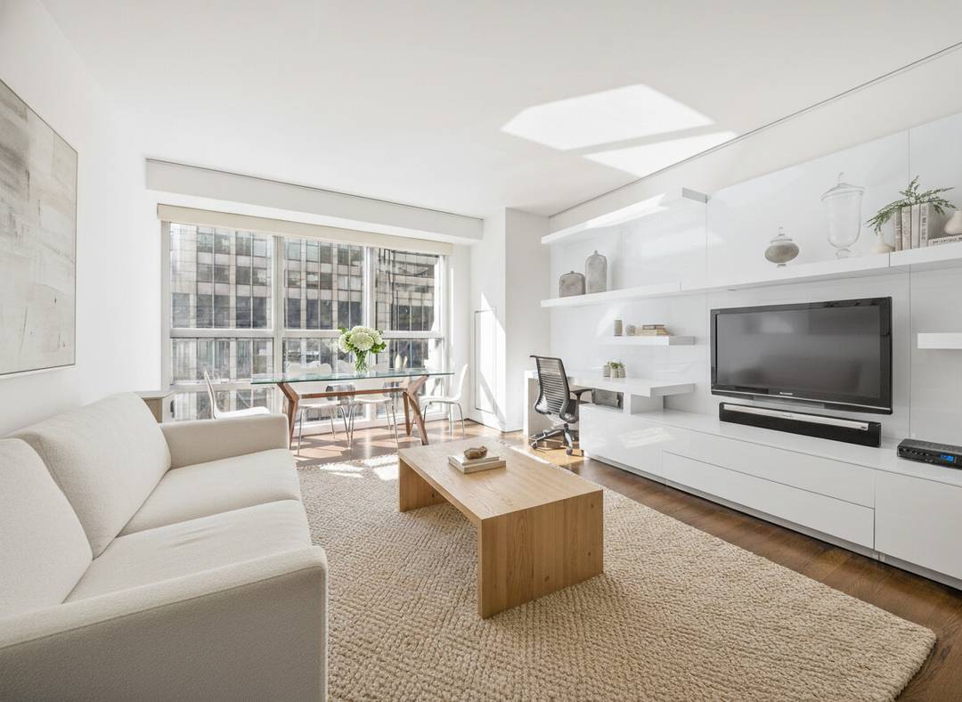 Welcome to your urban oasis nestled in the prestigious address of 146 West 57th Street, 37E.