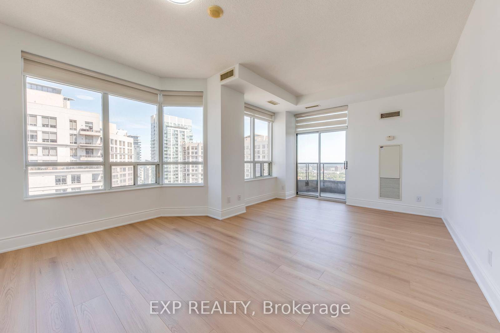 Stunning 2 Bedroom Corner Suite Plus Den In The Highly Sought After 'Grand Ovation' Building.