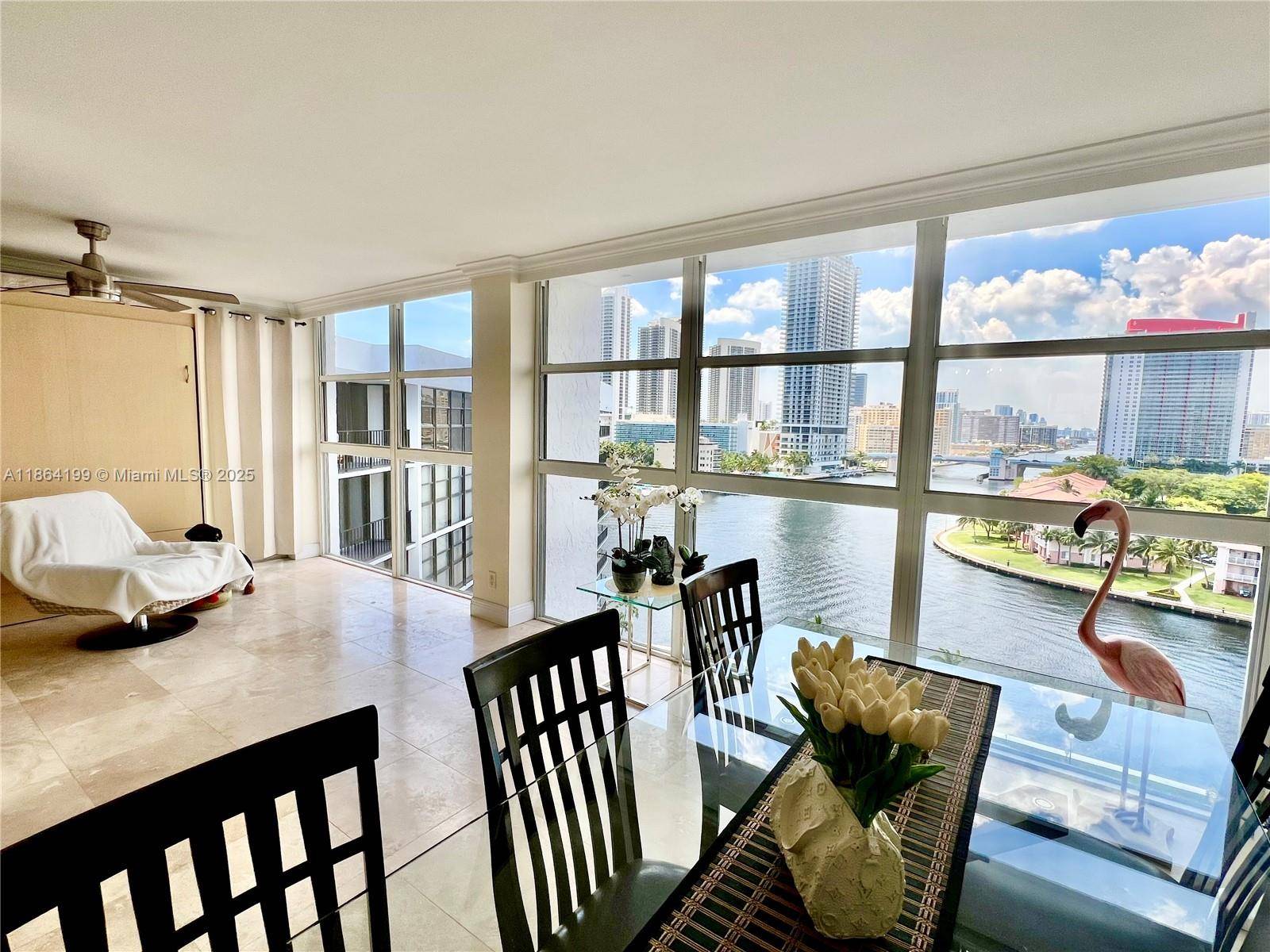 EXPERIENCE BREATHTAKING PANORAMIC VIEWS OF THE INTRACOASTAL WATERWAY, BAY, AND CITY SKYLINE FROM THIS BEAUTIFULLY UPDATED, MOVE IN READY RESIDENCE.