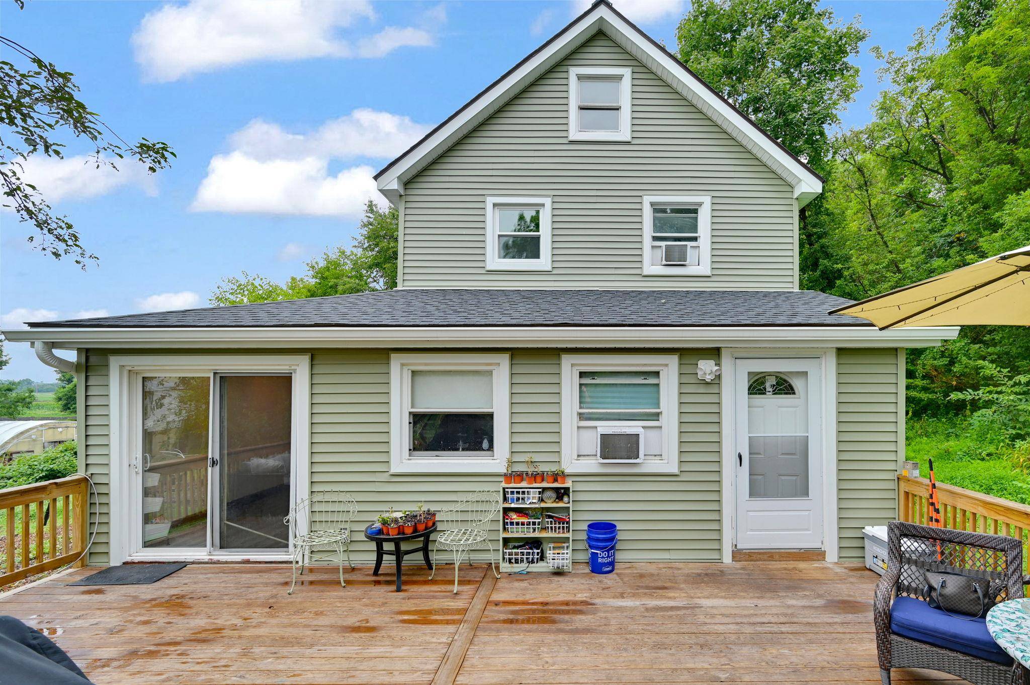 Welcome to 9 Fava Lane, a rare and versatile offering in the heart of the Pine Island farming community.