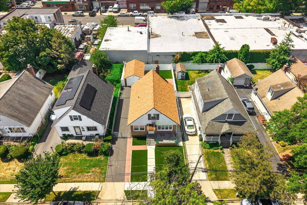 Beautifully renovated 4 bedroom, 2 bath Cape on a quiet, tree lined block in the Village of New Hyde Park.