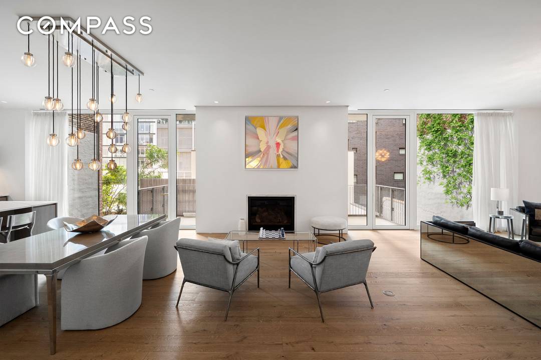 This impeccably designed, triple mint full floor residence in the heart of West Chelsea offers 4 bedrooms, 3.