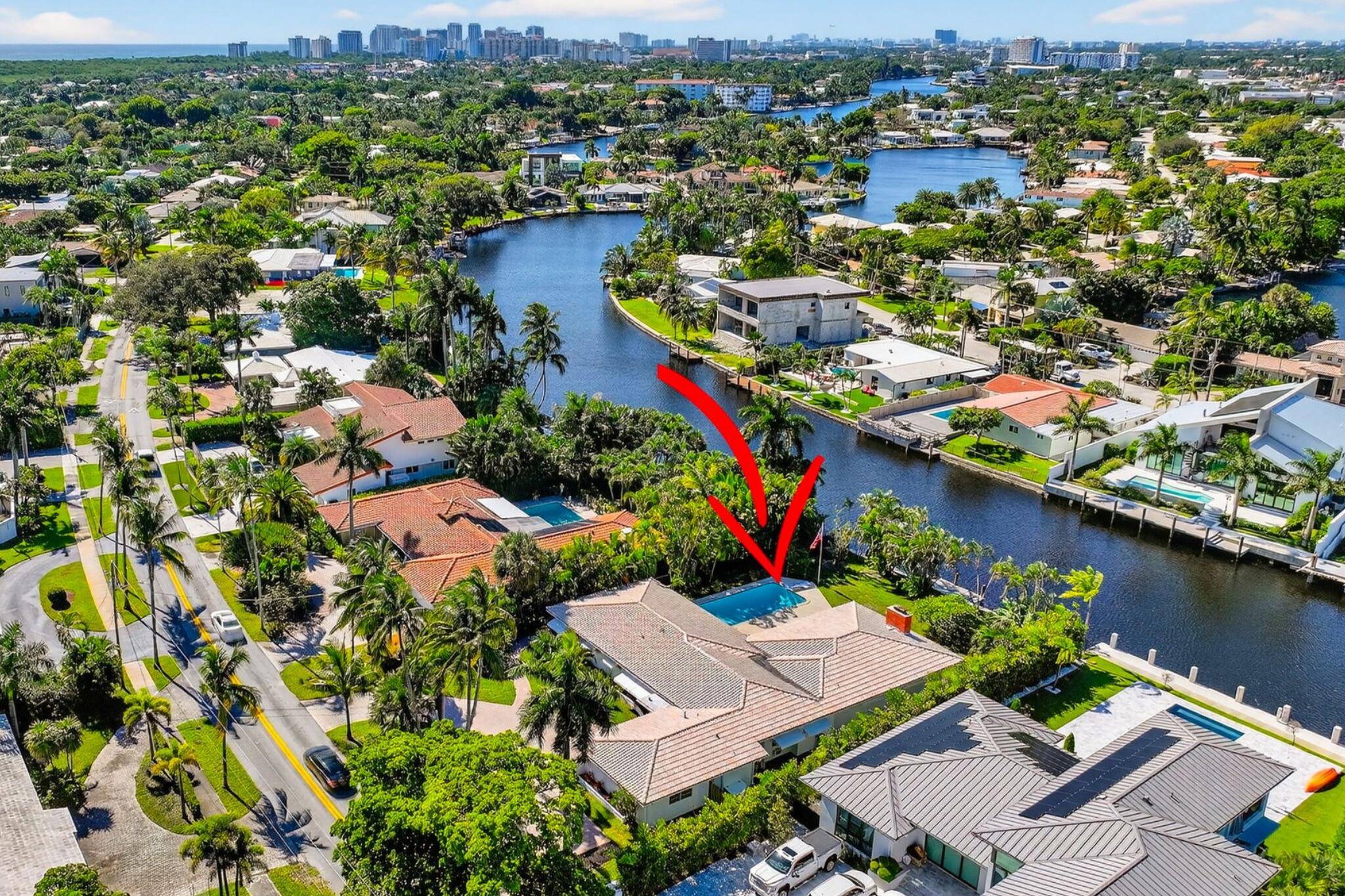Welcome to this stunning waterfront residence on coveted Middle River Drive in Fort Lauderdale's prestigious Coral Ridge neighborhood.