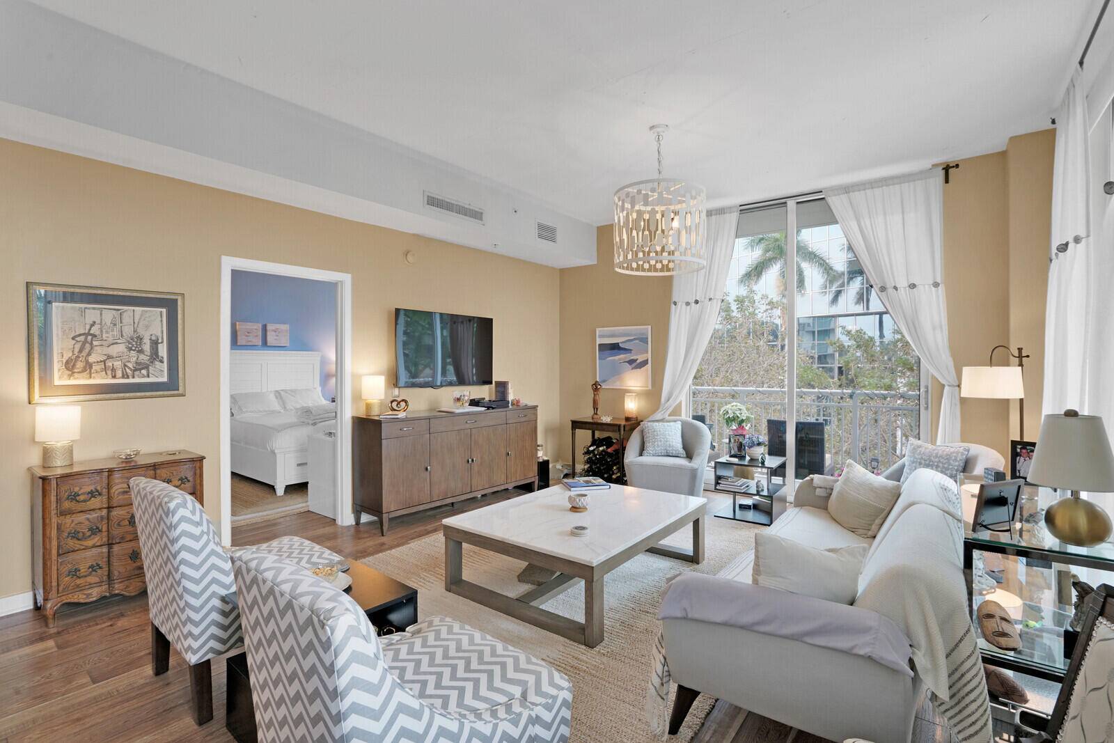 Oversized 2 bed 2 bath corner unit with almost 1, 400 sq ft of living space and a spacious wrap around balcony.