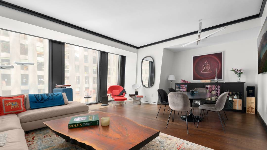 Welcome to Residence 21E at 53 West 53rd Street, a high floor 1 bedroom, 1.