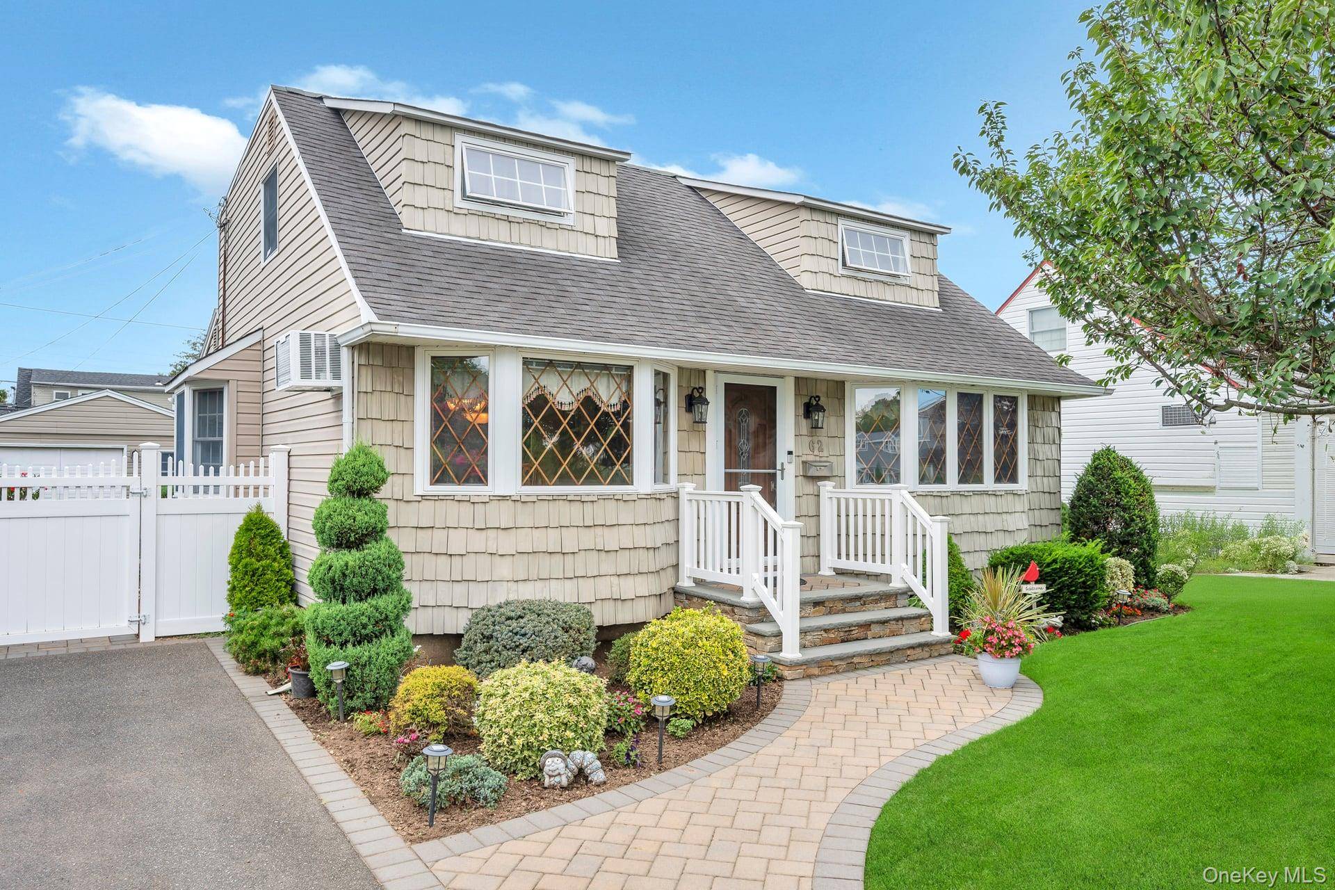 Beautifully Maintained Cape with Modern Elegance Welcome to this stunning and well maintained Cape style home in Hicksville boasting 4 bedrooms and 2.
