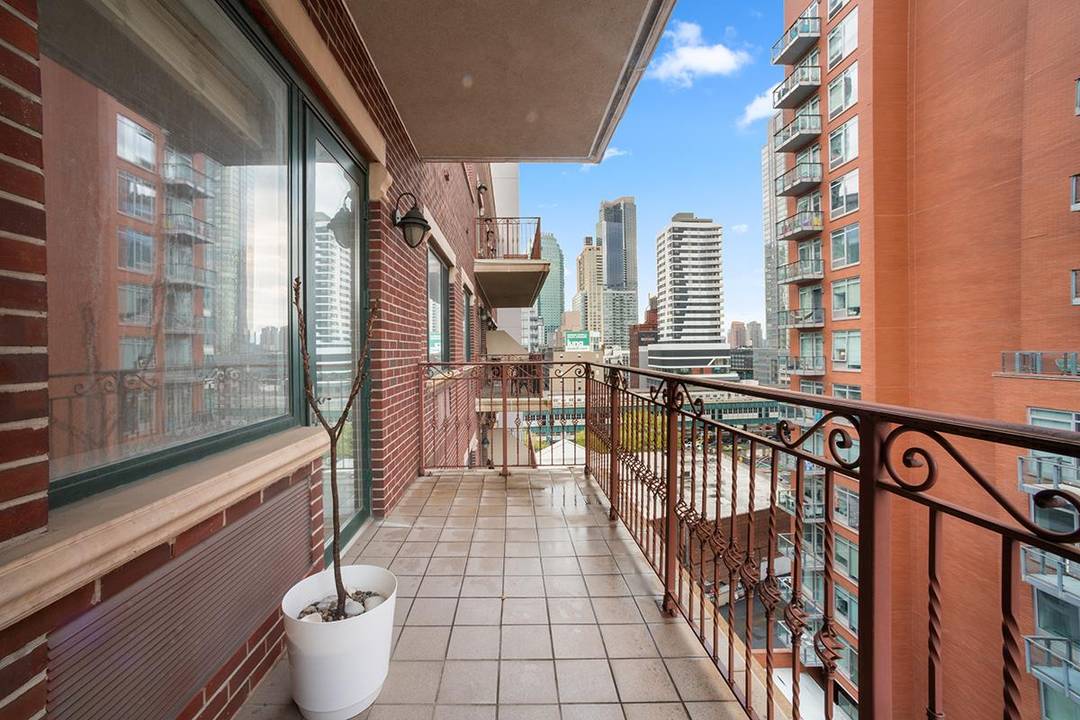 New On Market ! Welcome to Unit 9C at The Queens Plaza Condominium.