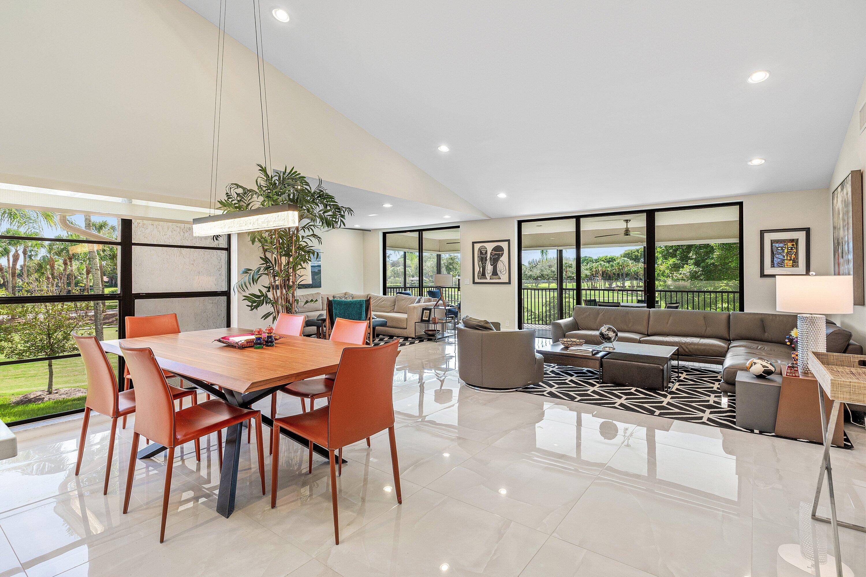 Contemporary penthouse in Eastgate at Hunters Run Country Club with unparalleled golf water views.
