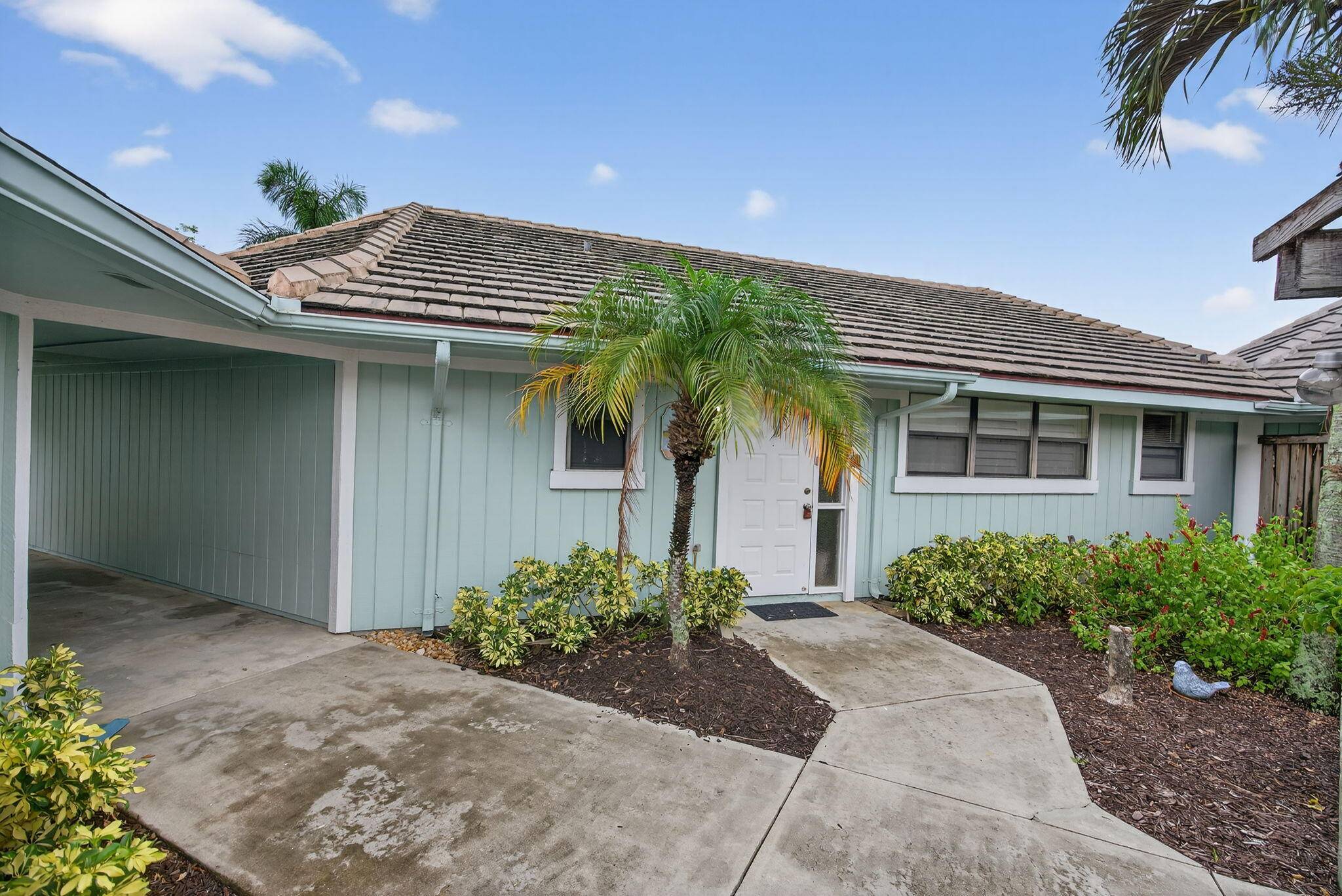 Enjoy 'vacation style' living in this seaside community of Bella Vista in Jupiter.