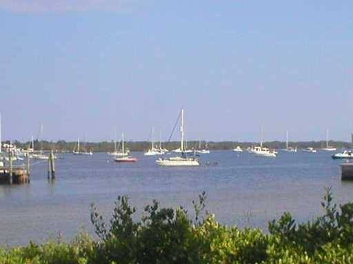 Enjoy breathtaking Intracoastal views from this unique, spacious, and beautifully updated first floor condo with its own private entrance and fenced yard.