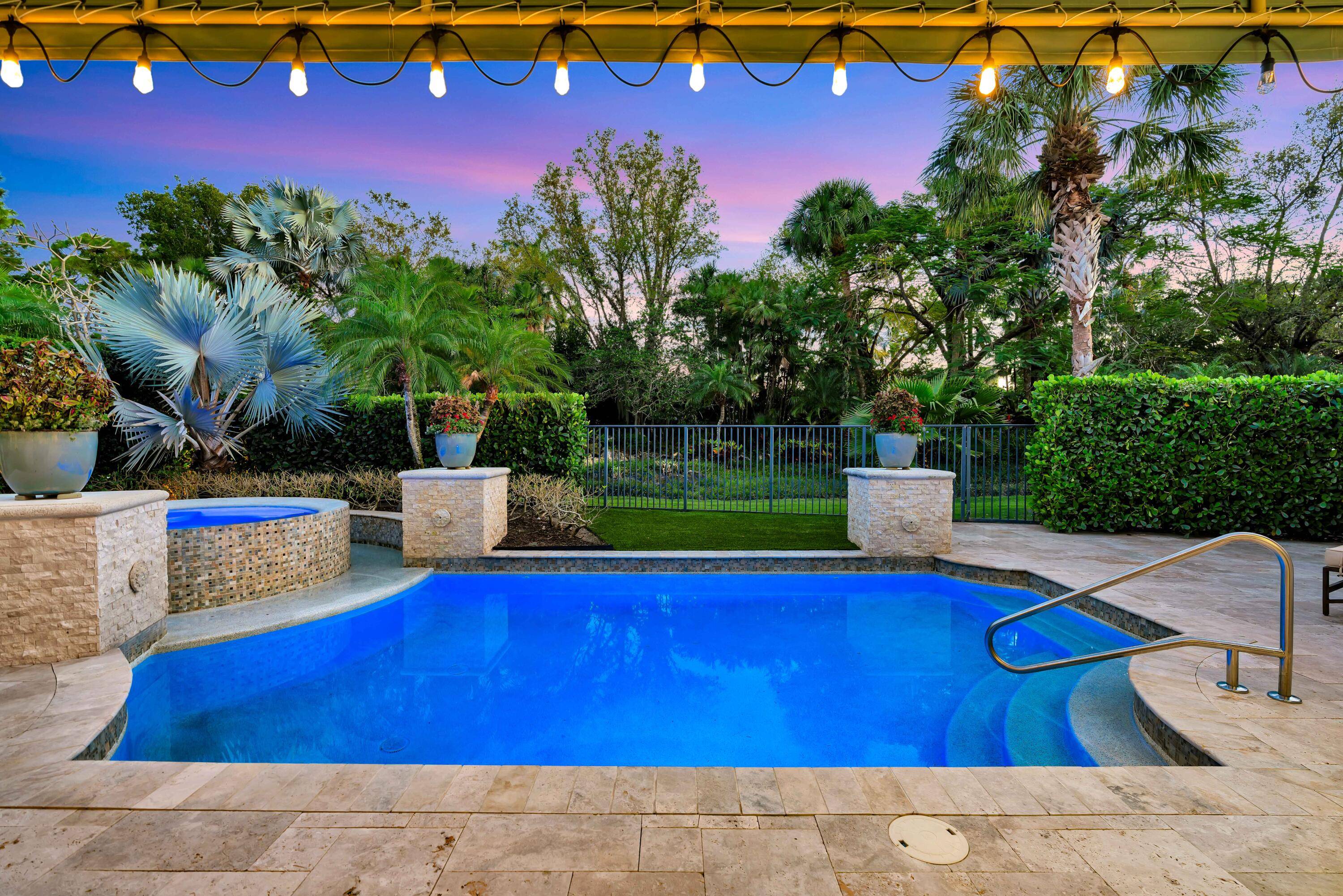 Welcome to 11216 Orange Hibiscus Lane, a meticulously updated and fully furnished residence with a NEW ROOF in the prestigious Old Palm Golf Club.