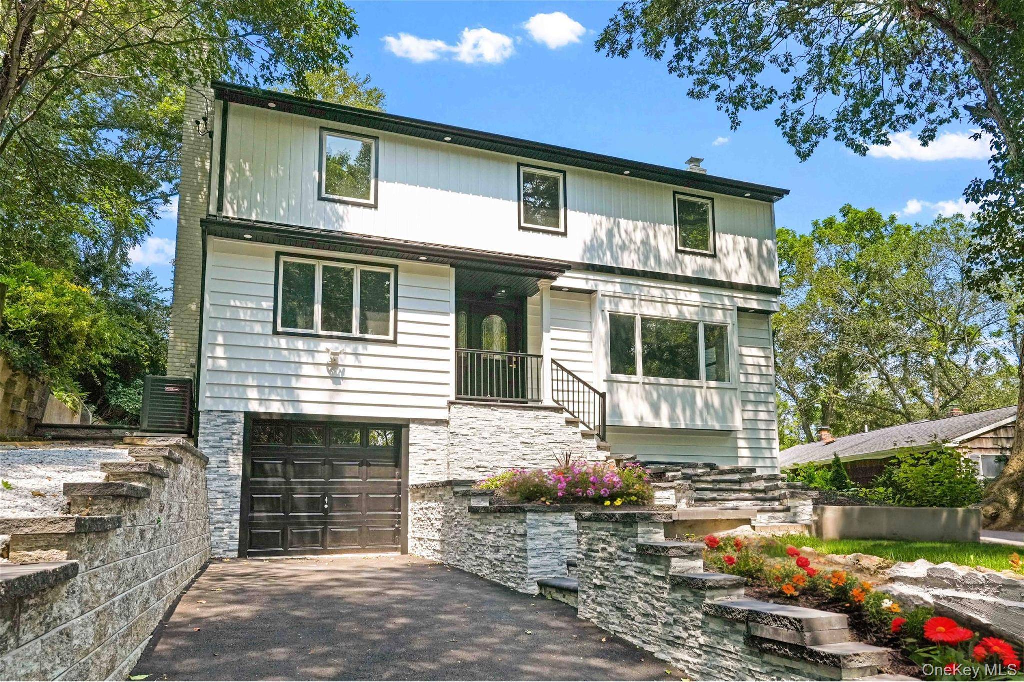 Welcome to 45 Forest Drive, Centerport A Thoughtfully Renovated Retreat in the Harborfields School District Nestled on a quiet, tree lined street in the heart of Centerport, this fully renovated ...