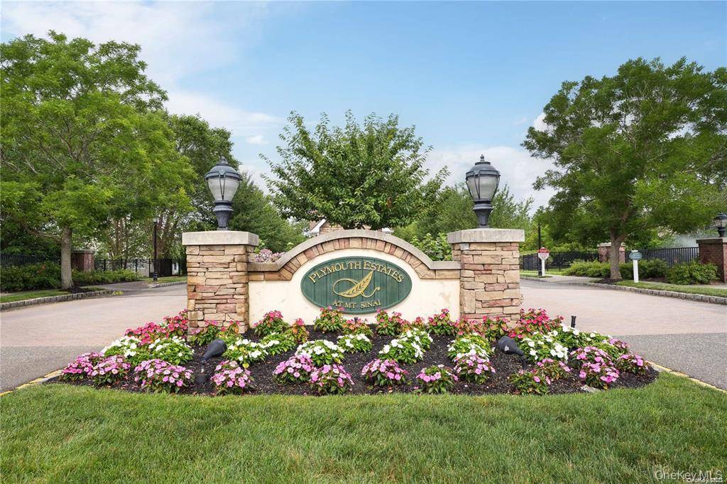 Welcome to Plymouth Estates in Mount Sinai a beautifully maintained Ashby lower model end unit in a highly desirable 55 24 hour gated community.