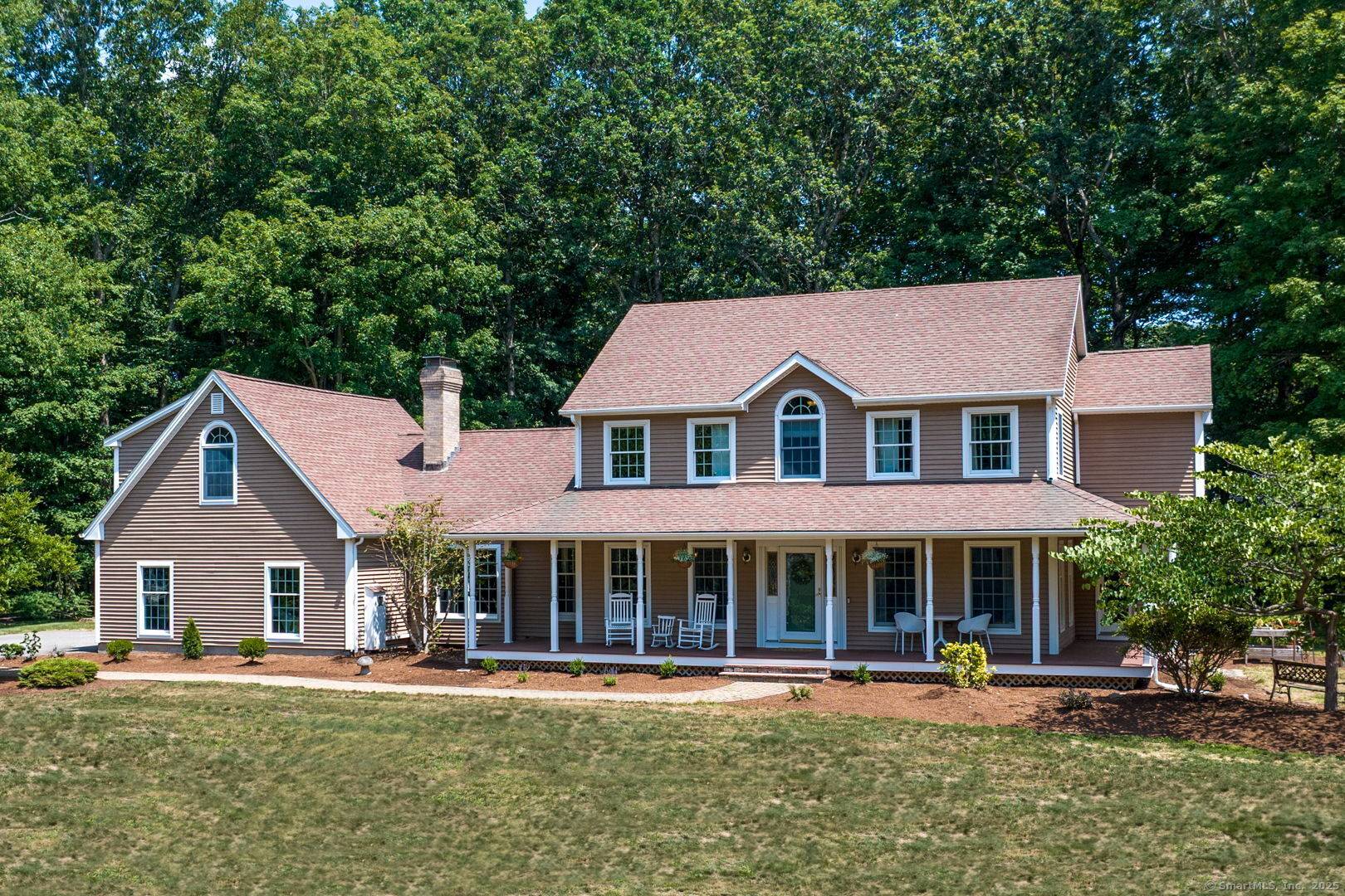 The quintessential New England Colonial in probably the most fabulous neighborhood in all of Hebron !