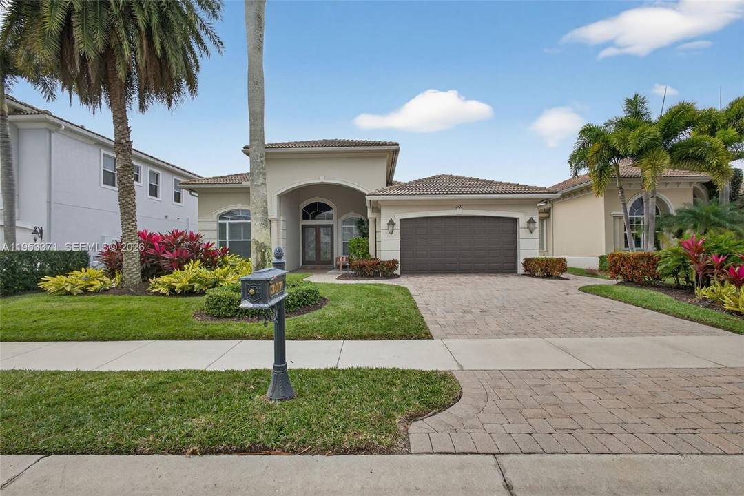 Beautiful single story residence in prestigious Frenchman s Reserve offering refined country club living close to beaches, dining, shopping, and entertainment.