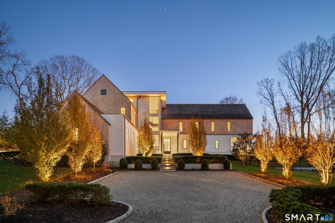 Experience the ultimate in luxury with this custom designed Bluewater Home, nestled on a sought after Greens Farms cul de sac.