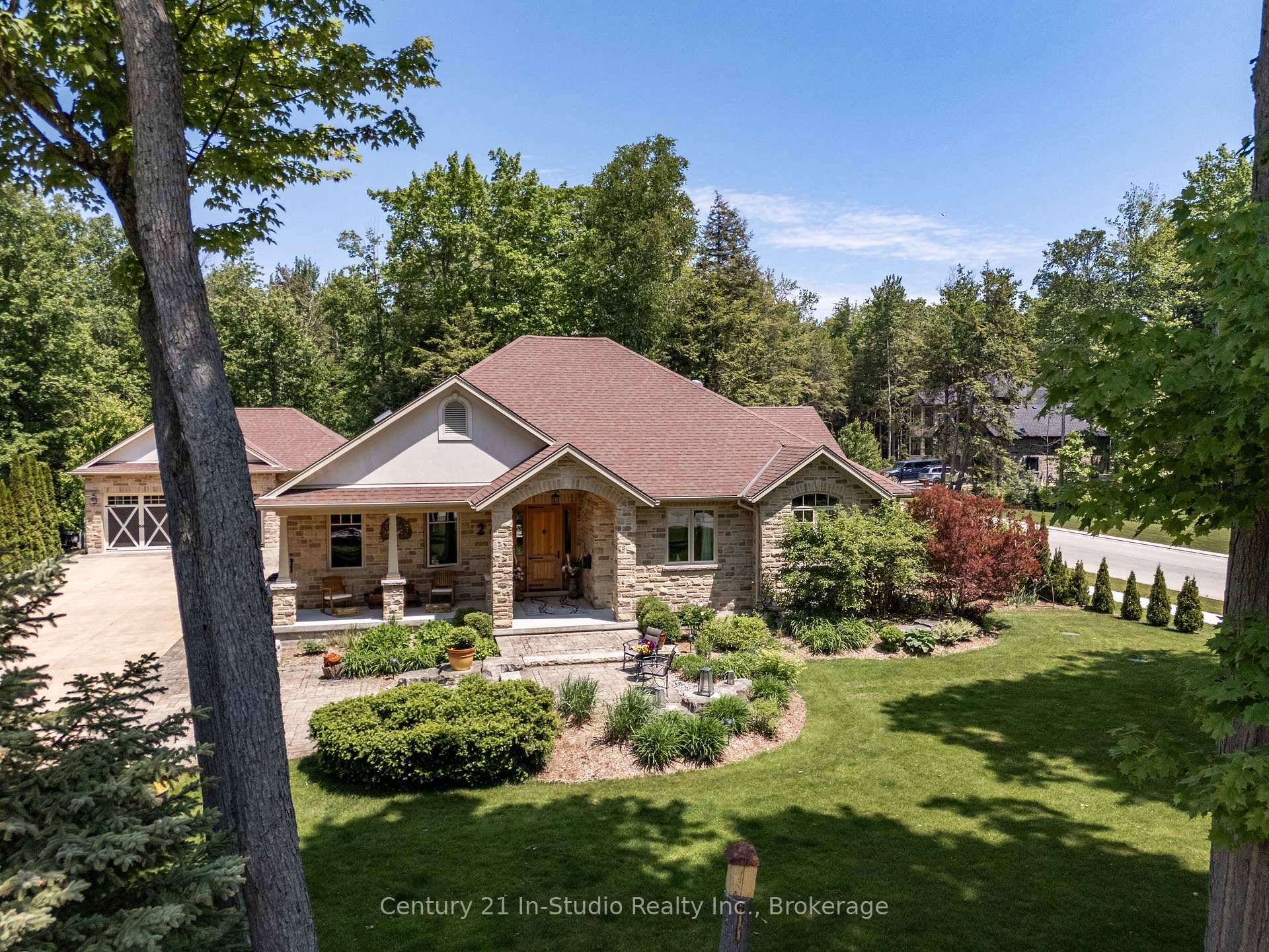 Nestled on a half acre lot surrounded by mature trees, this exquisite Craftsman inspired executive residence custom built by Seaman offers a blend of timeless design and modern luxury.