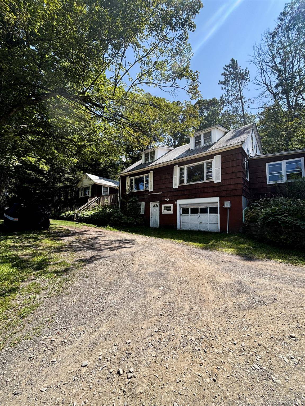 Explore endless possibilities with this 4 unit investment property situated upon 32.