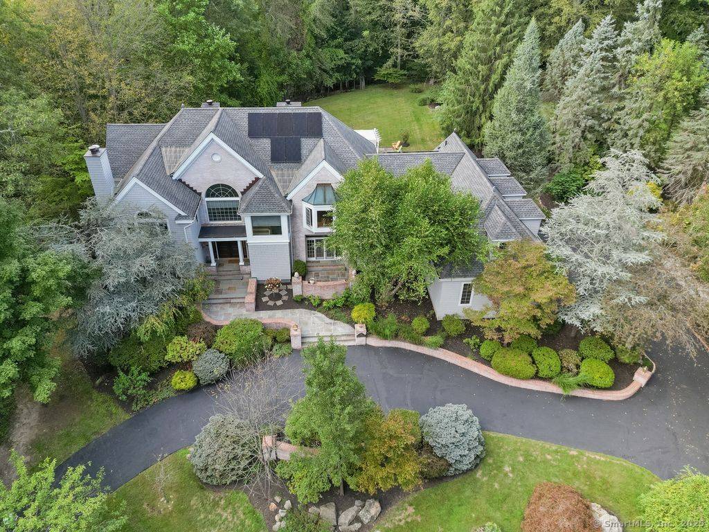 Welcome to 39 Running Brook Lane, an exceptional custom built home set on 2.