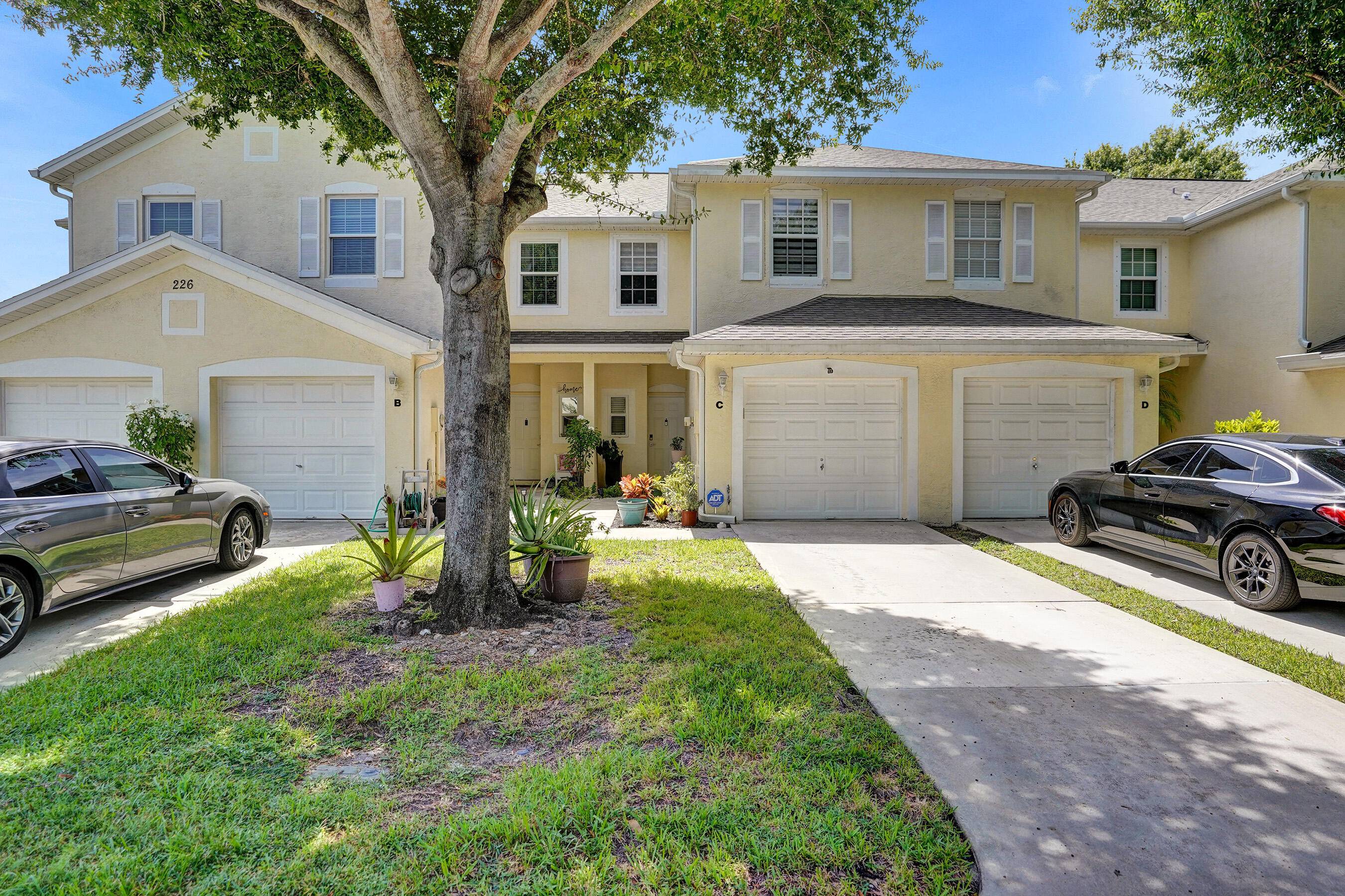 TURN KEY. A newly renovated townhome awaits in Charter Club of Greenacres.