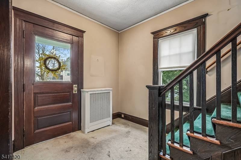 Opportunity knocks in this 3 BR 1 BA Colonial built in 1918 that features excellent structural bones and architectural elements from its by gone era that include oversized windows, vintage ...