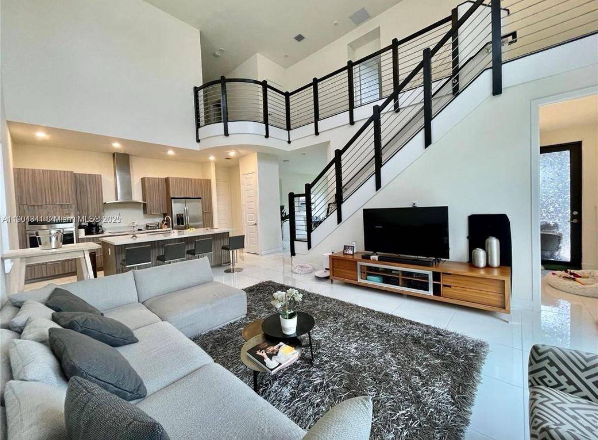 Discover the essence of elegance in this Spectacular Luxury Residence located on one of the most exclusive corners of the Satori in Miami Lakes.