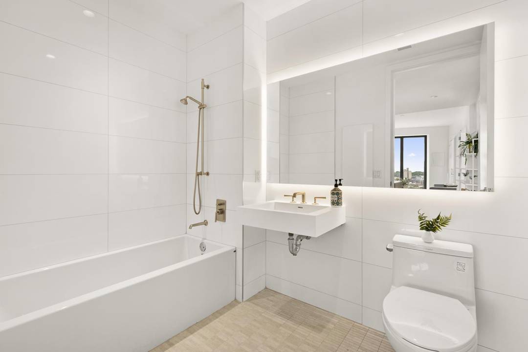 The I line is a three bedroom, two bathroom apartment at the very apex of the building's stunning angular architecture.