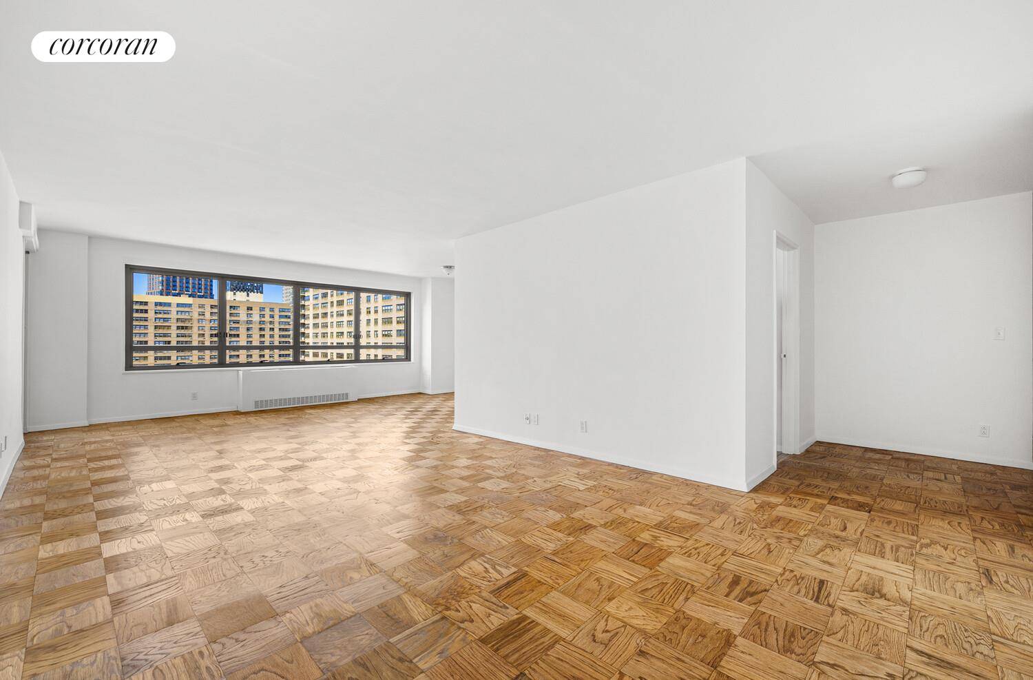 Perched on one of the building's most coveted lines, Residence 23E captures brilliant southwest light from its high floor perch, filling every room with warmth and open sky views.