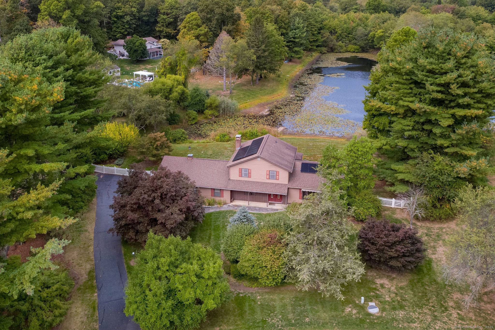 Beautifully sited on 1. 3 level acres with direct frontage on Thirsty Lake, this contemporary Colonial offers the perfect blend of comfort, space, and convenience.
